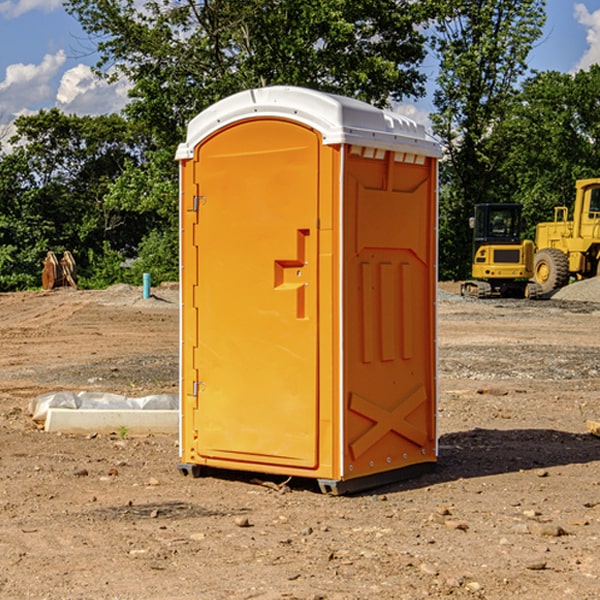 what is the cost difference between standard and deluxe portable restroom rentals in Buckland OH